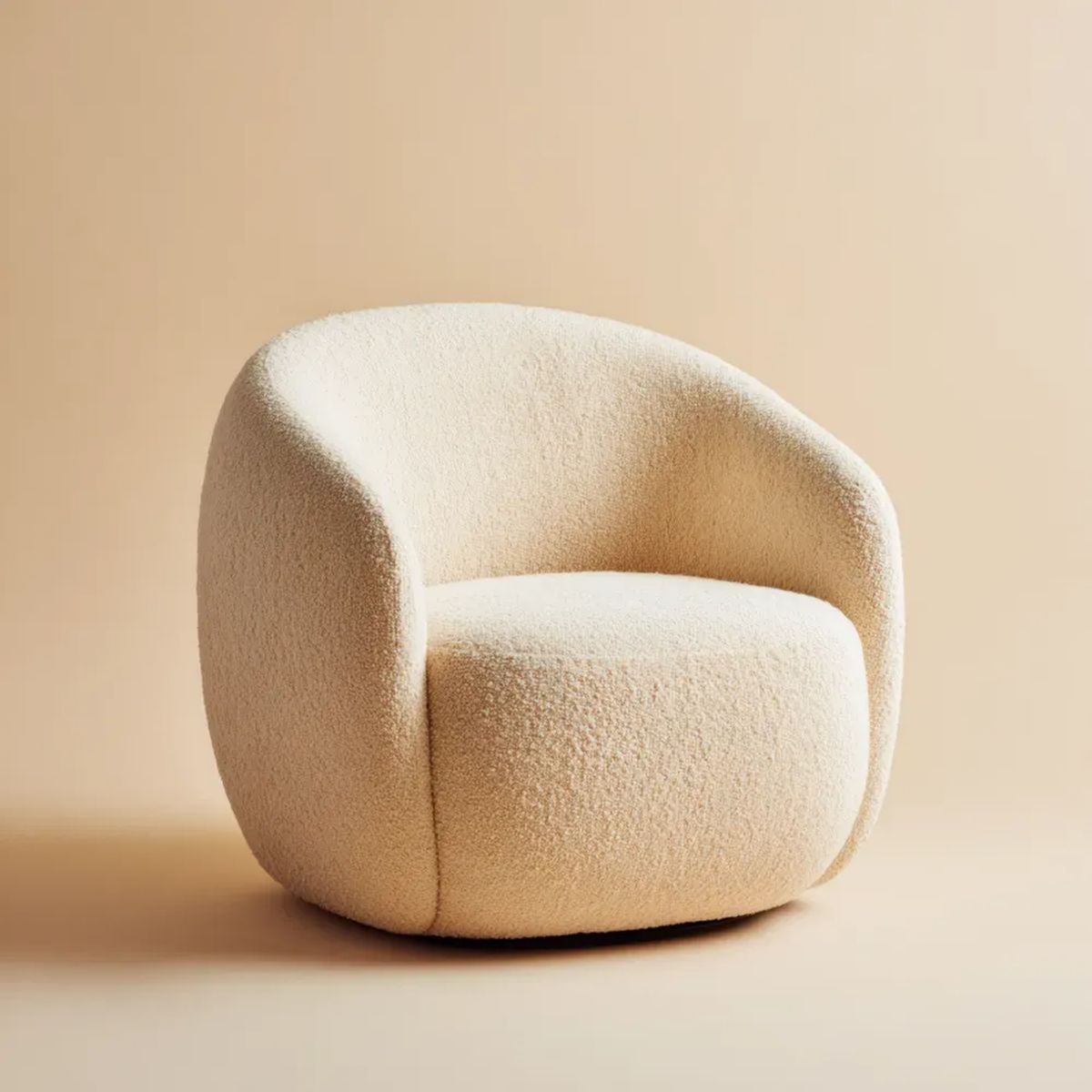 Kremowy fotel wypoczynkowy z tapicerką bouclé 78 x 75 x 76 cm